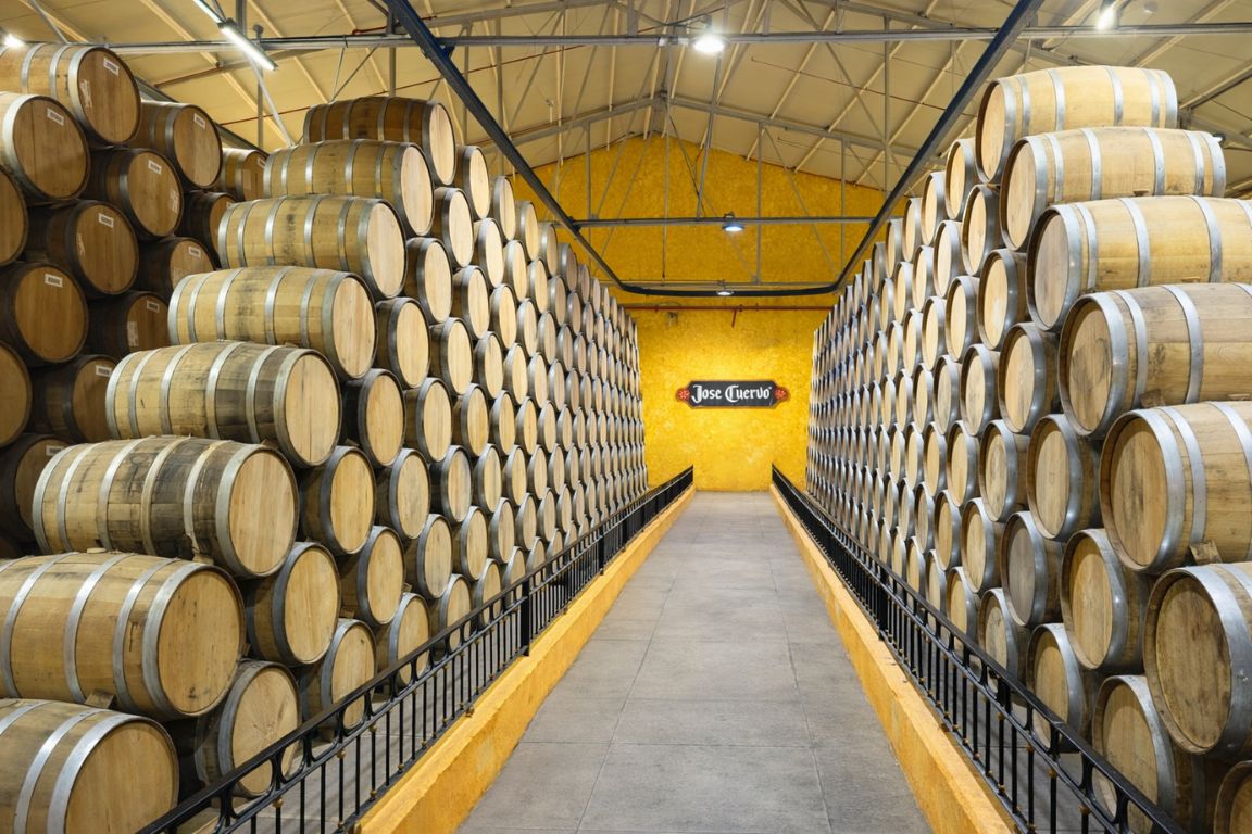 Tequila barrels stored at La Rojeña distillery, home of Jose Cuervo in Jalisco Mexico, seen during a guided tour with Guadalajara Tequila Tours
